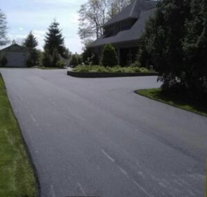 Asphalt paving services on residential driveway in the Gulf Coast with a smooth finish